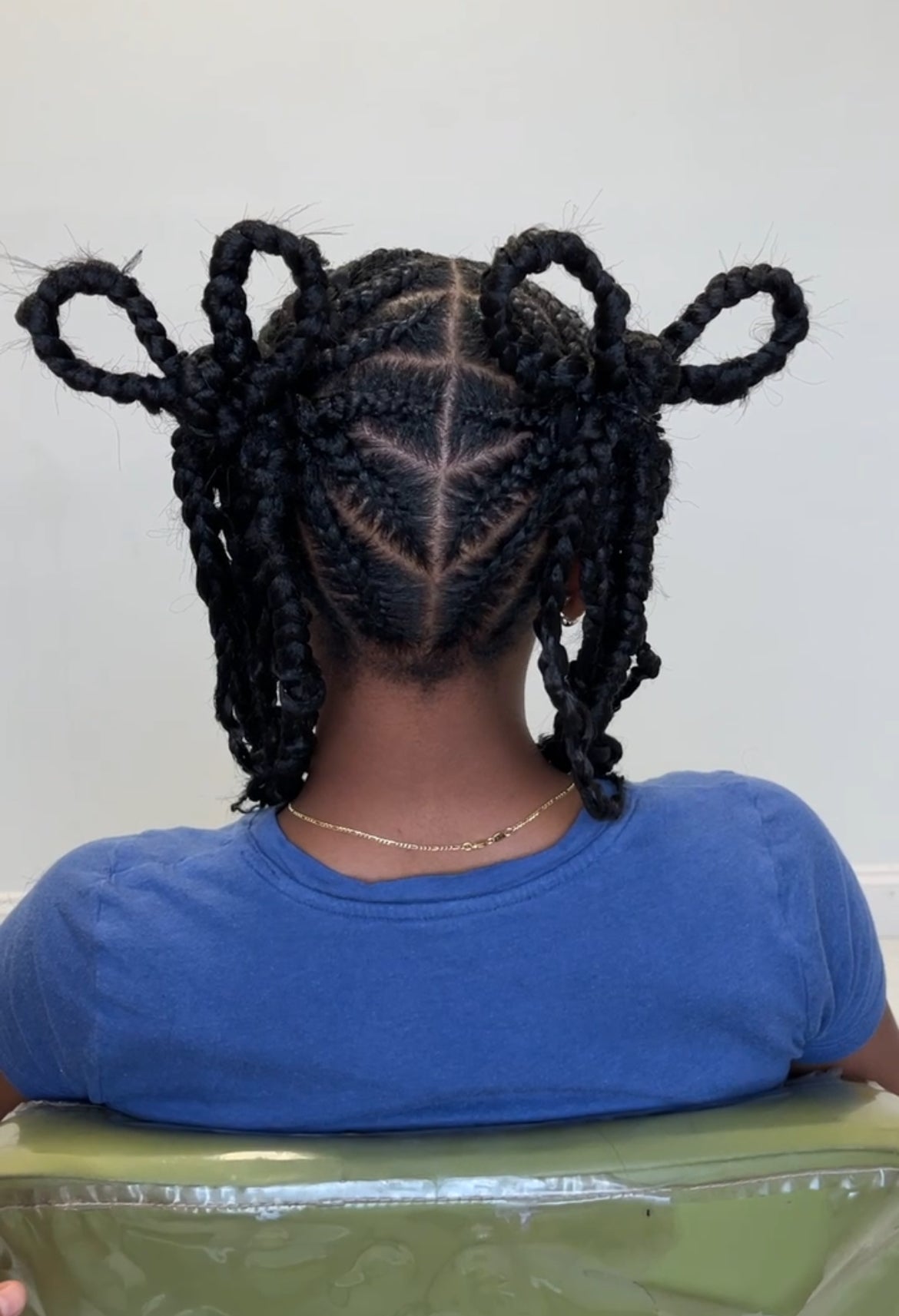 TWO-BRAIDED PONY